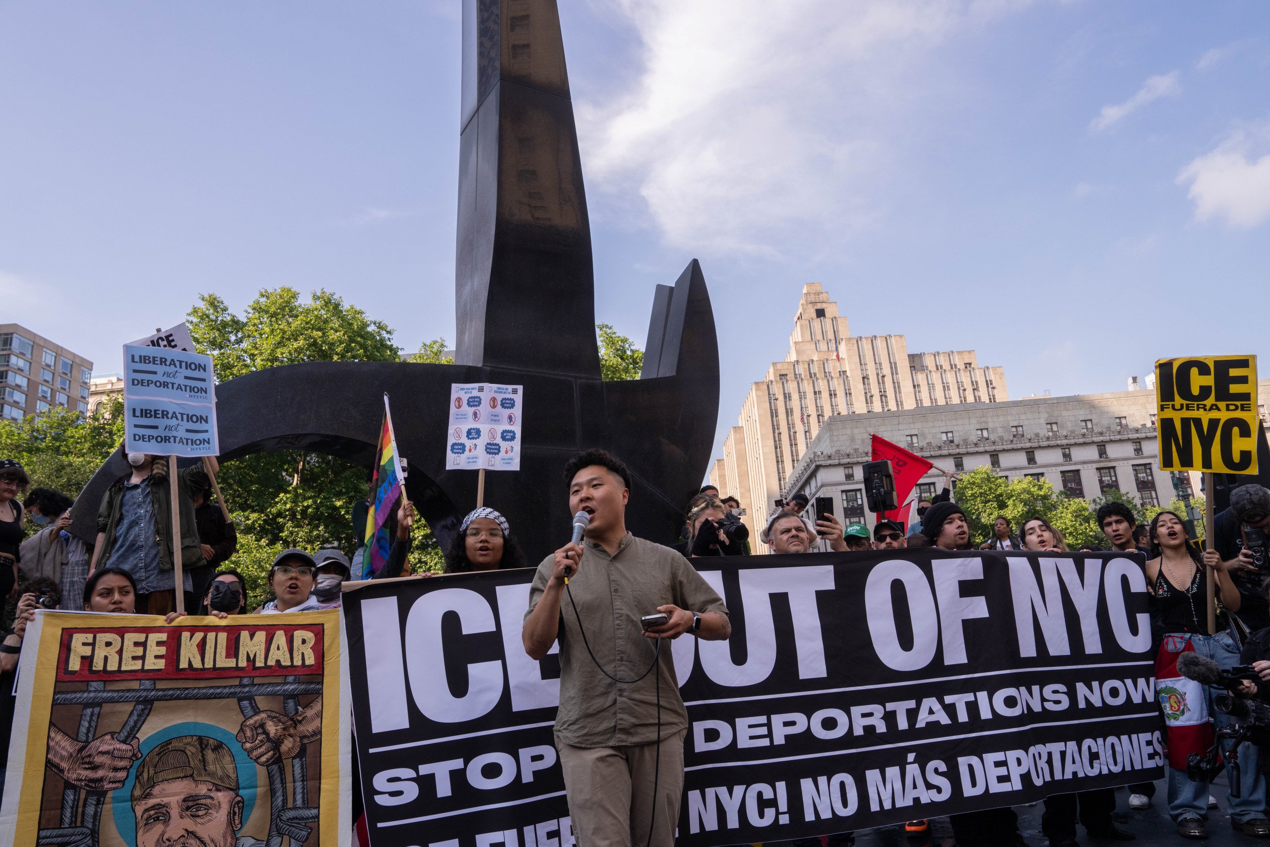 David Chung speaking at anti-ICE rally